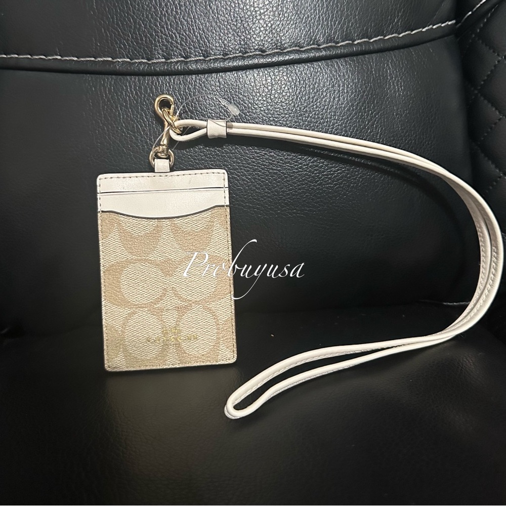 NWT Coach Id Lanyard
In Signature Canvas light khaki chalk style number 63274